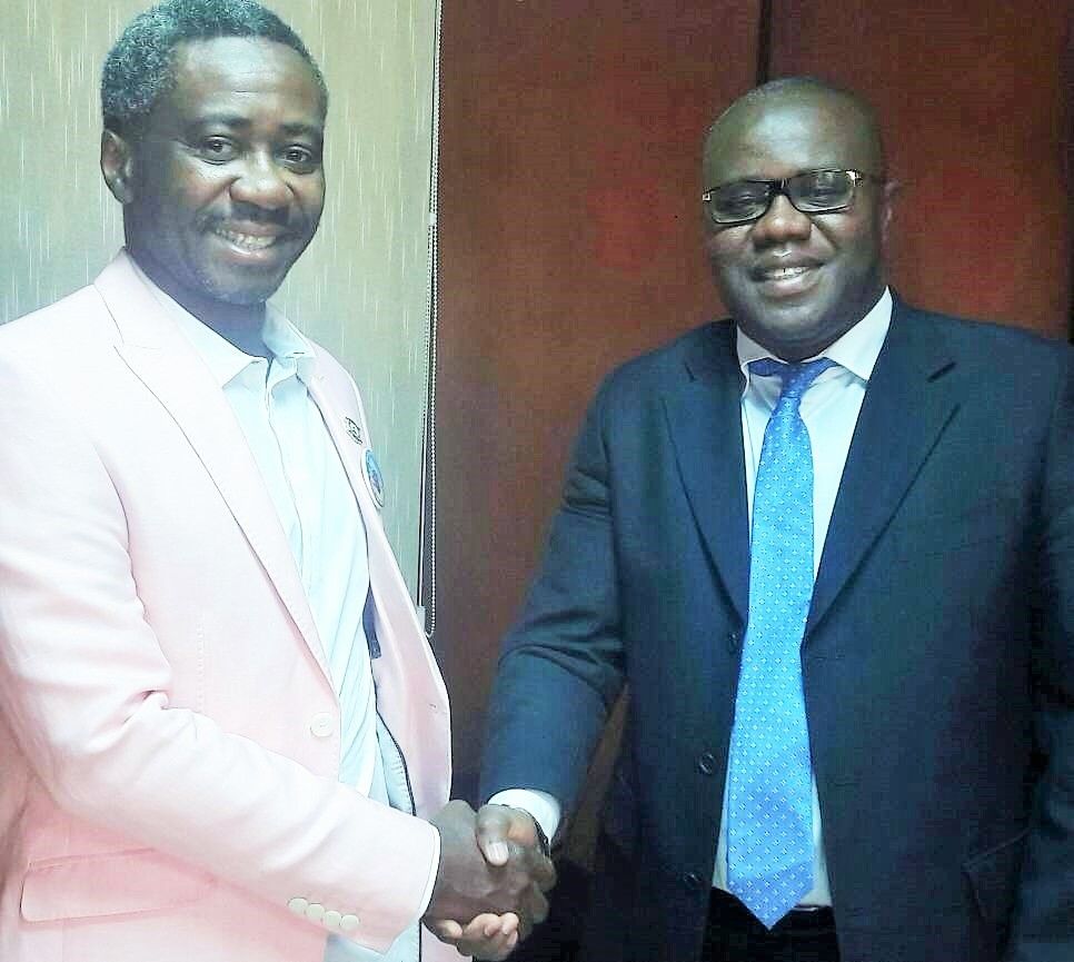 Commissioner Kollie Jr (left) welcomes to his office the Secretary General of the FCWC, Mr. Seraphin Dedi Nadje 