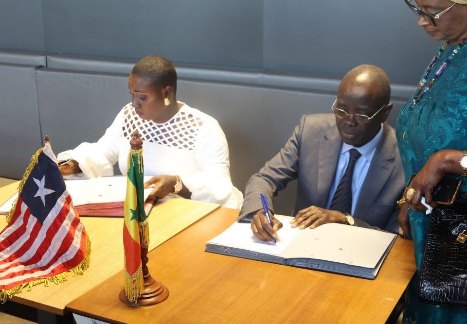 DG Glassco of Liberia and Hon. Hon. Pape Sagna Mbaye Senegal Minister of Fisheries signing the MoU