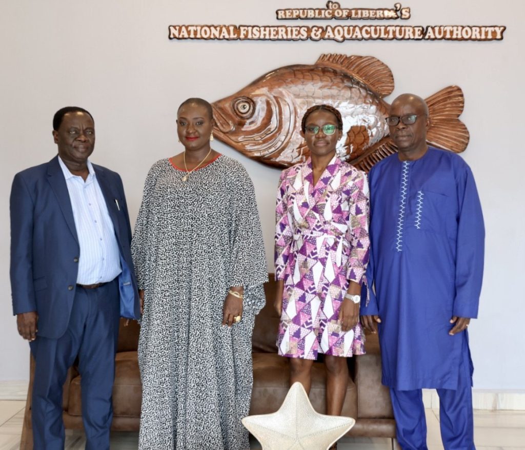 Group photo Showing from the Left to the right hand side, FCWC's S.G. Gaston Djihinto, Hon. Emma Glassco of NaFFA, Viviane Koutob from TMT and William Boeh.
